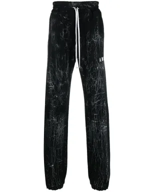 AMIRI クラックドダイ ロゴ トラックパンツ - サムネイル1