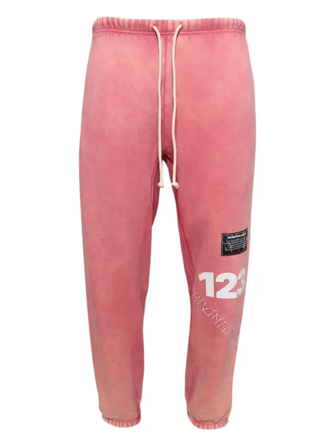 RRR123 RRR123 ピンクのディストレスド・トラックパンツの商品画像