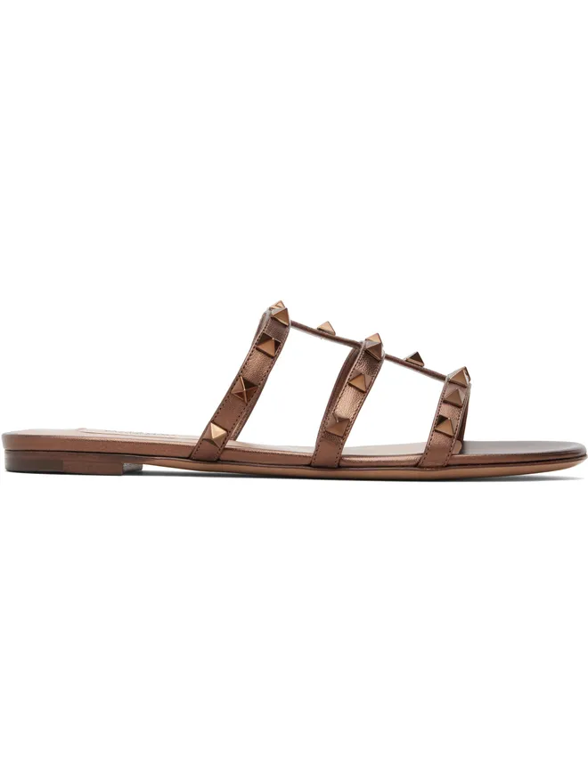 Valentino Garavani Valentino Garavani Rockstud メタリック ナッパ フラット スライドサンダルの商品画像